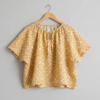 Double gauze/muslin JACQUARD Dots dark yellow