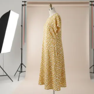 Double gauze/muslin JACQUARD Dots dark yellow