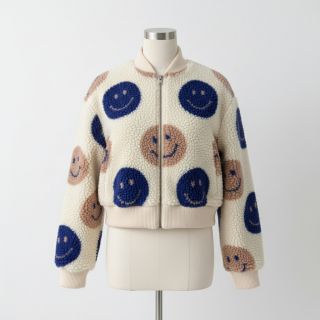 Coat fabric TEDDY JACQUARD Happy faces ecru