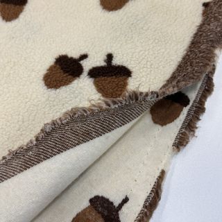 Coat fabric TEDDY JACQUARD Acorns