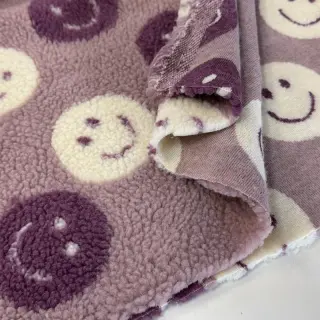Coat fabric TEDDY JACQUARD Happy faces mauve