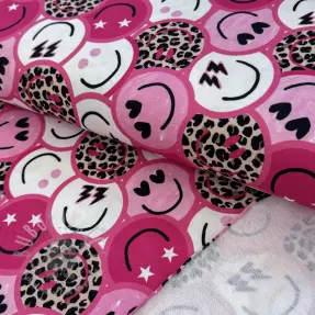 Sweat fabric Happy faces pink digital print