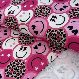 Sweat fabric Happy faces pink digital print