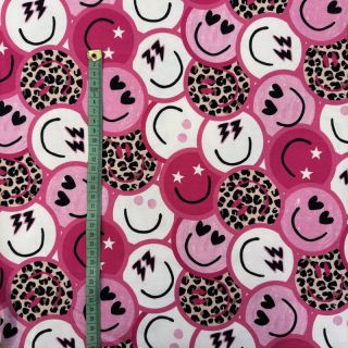 Sweat fabric Happy faces pink digital print