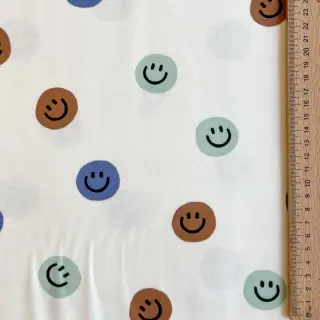 Cotton fabric FLANNEL Happy faces off white green