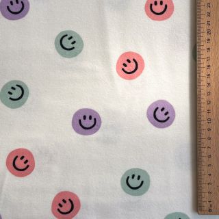 Cotton fabric FLANNEL Happy faces off white lilac