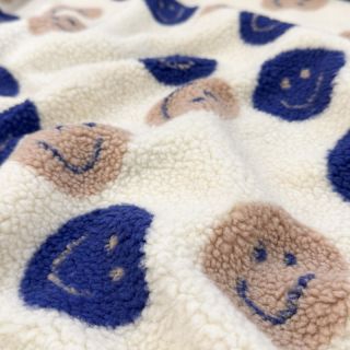 Coat fabric TEDDY JACQUARD Happy faces ecru