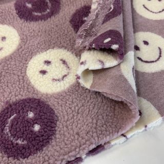 Coat fabric TEDDY JACQUARD Happy faces mauve