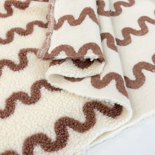 Coat fabric TEDDY JACQUARD Waves camel
