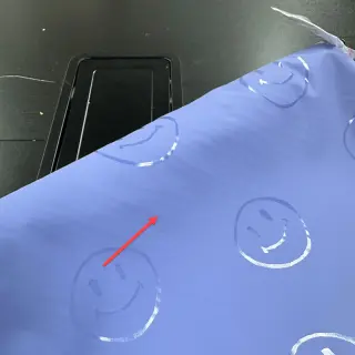 Raincoat fabric Happy faces purple 2nd class